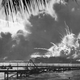 The destroyer USS Shaw explodes as two bombs penetrate her forward magazine